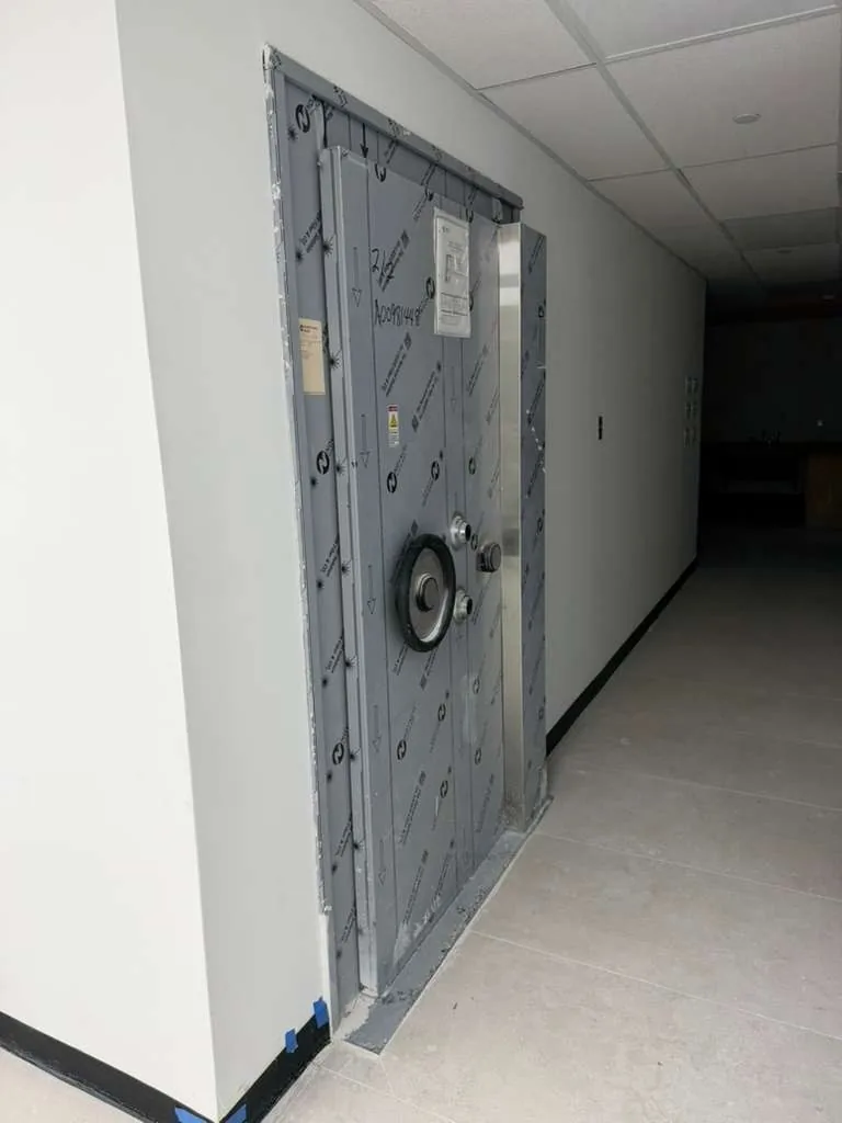 One of 2 built-in walk-in vault doors off the back-of-house corridor